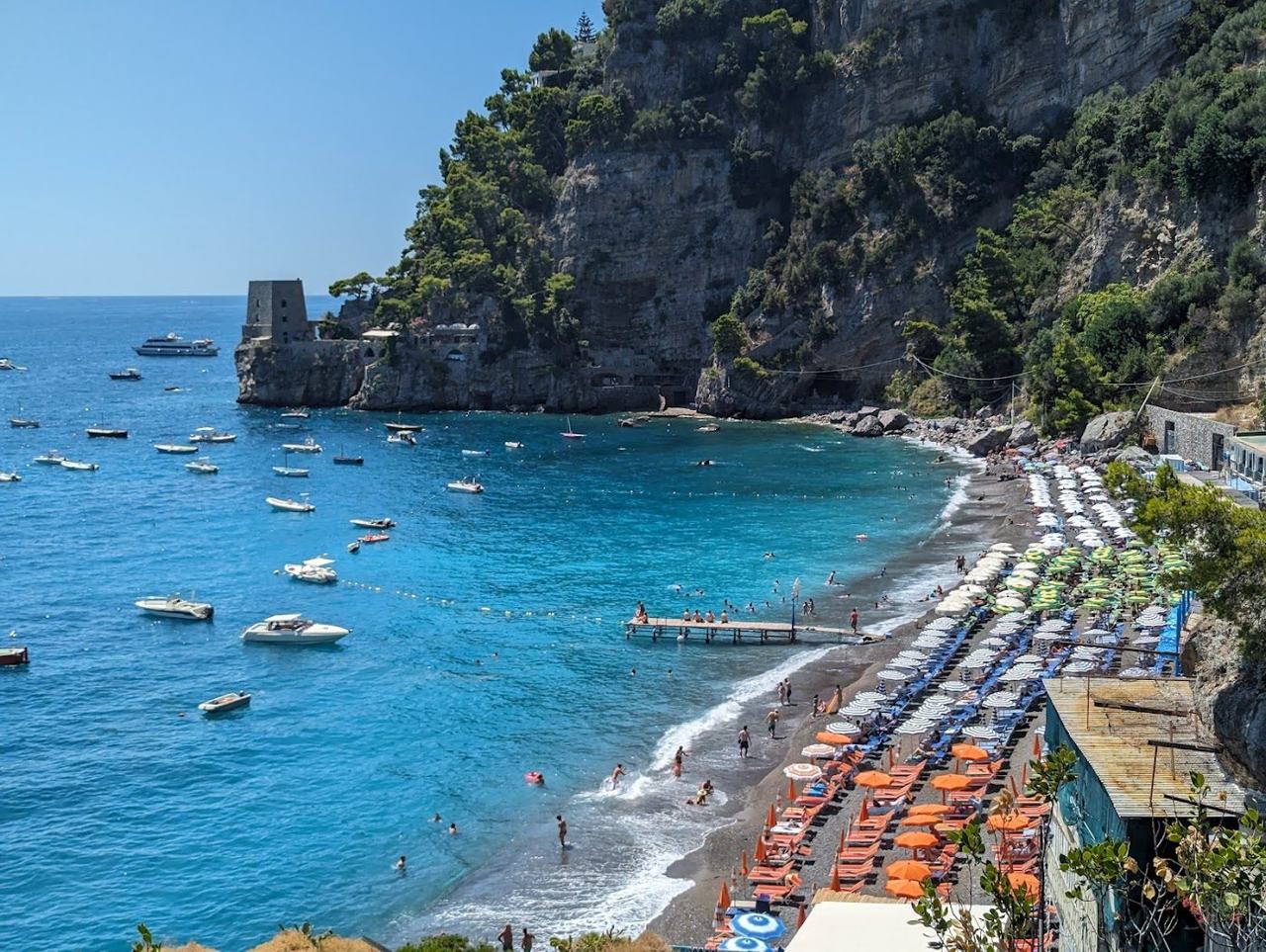 Fornillo beach at Positano below the cliffs with the medieval watchtower above