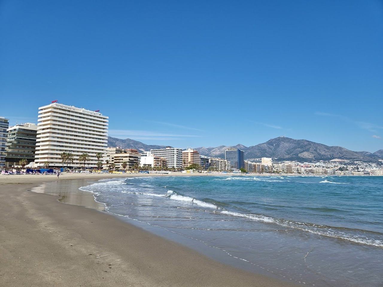 Fuengirola town beach and long seafront promenade on the Costa del Sol
