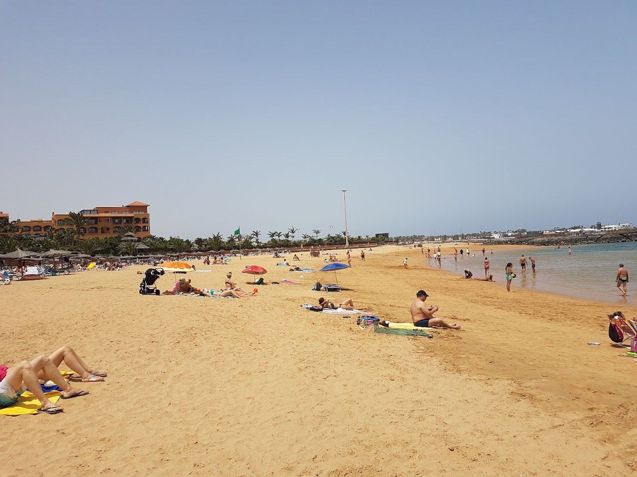 Calm sheltered water at the horseshoe bay of Caleta de Fuste on Fuerteventura