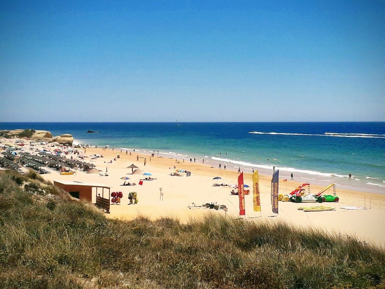 Praia da Gale golden sand and low rock formations near Albufeira
