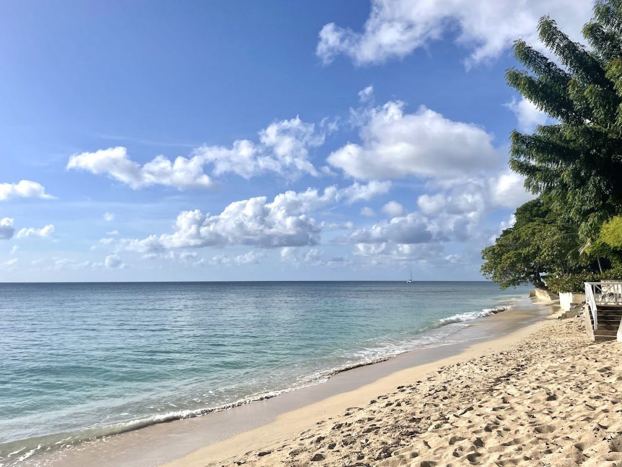Calm clear water and quiet pale sand along Gibbs Beach on the west coast of Barbados
