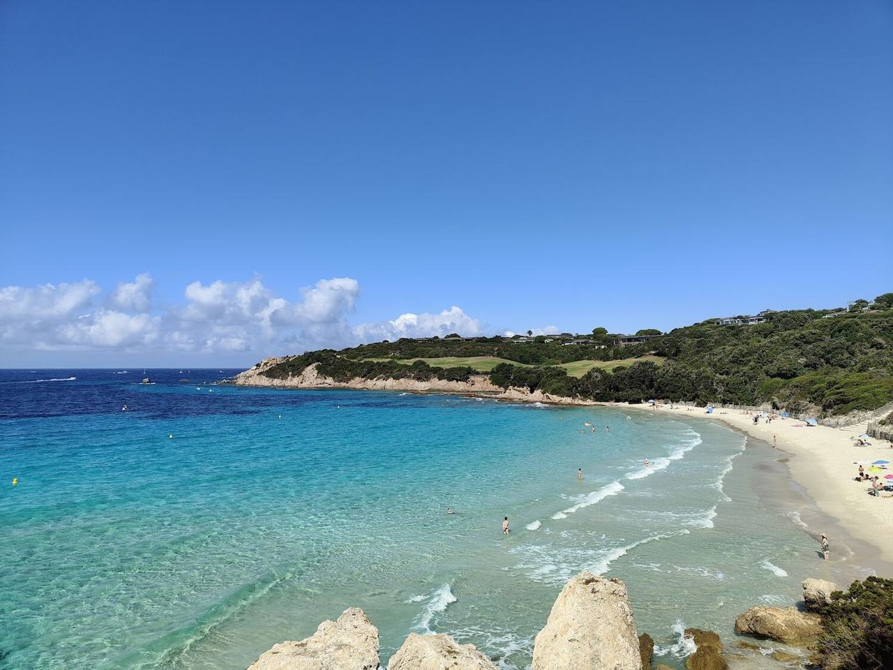 White sand and clear turquoise water at Grand Sperone Beach near Bonifacio in Corsica