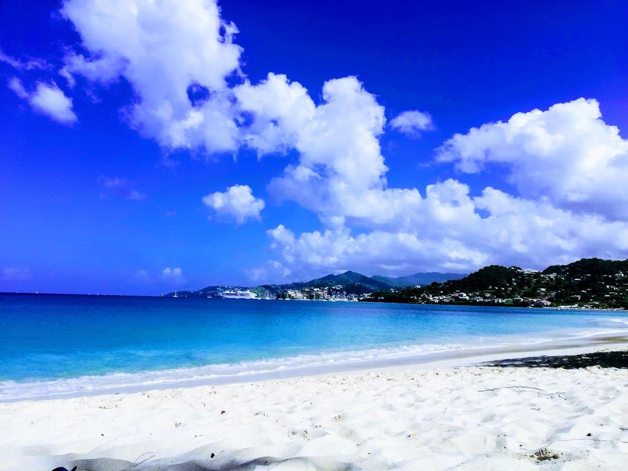 Warm evening light over a calm leeward beach on the southwest coast of Grenada