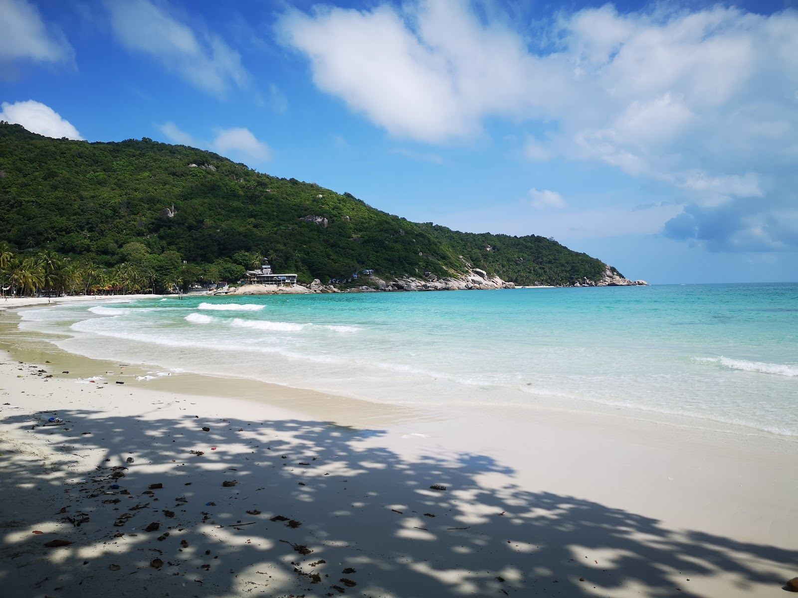 The wide sweep of Sunrise Beach at Haad Rin on the southern tip of Koh Phangan