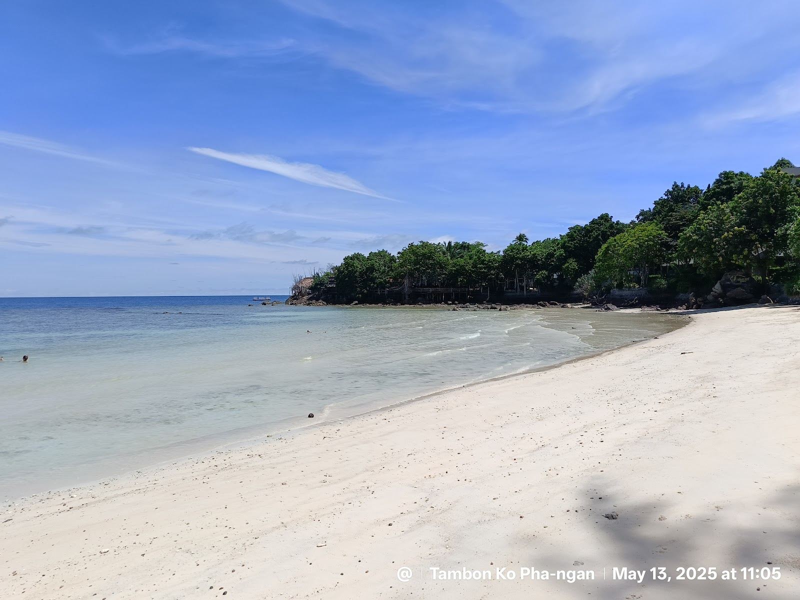 The small soft sand cove and calm west facing water of Haad Son, known as Secret Beach, on Koh Phangan