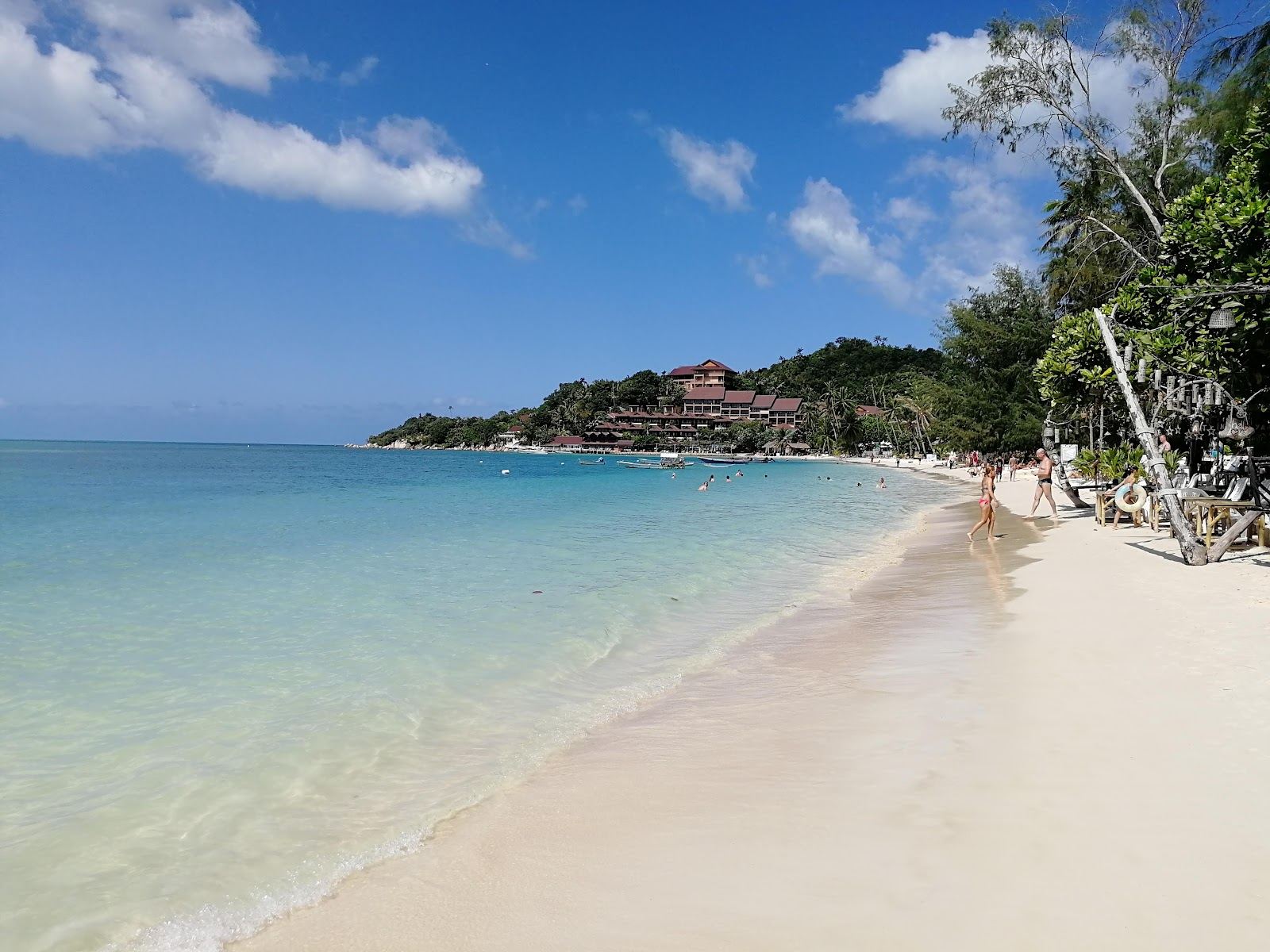 The long soft sand and calm west facing water of Haad Yao on the west coast of Koh Phangan