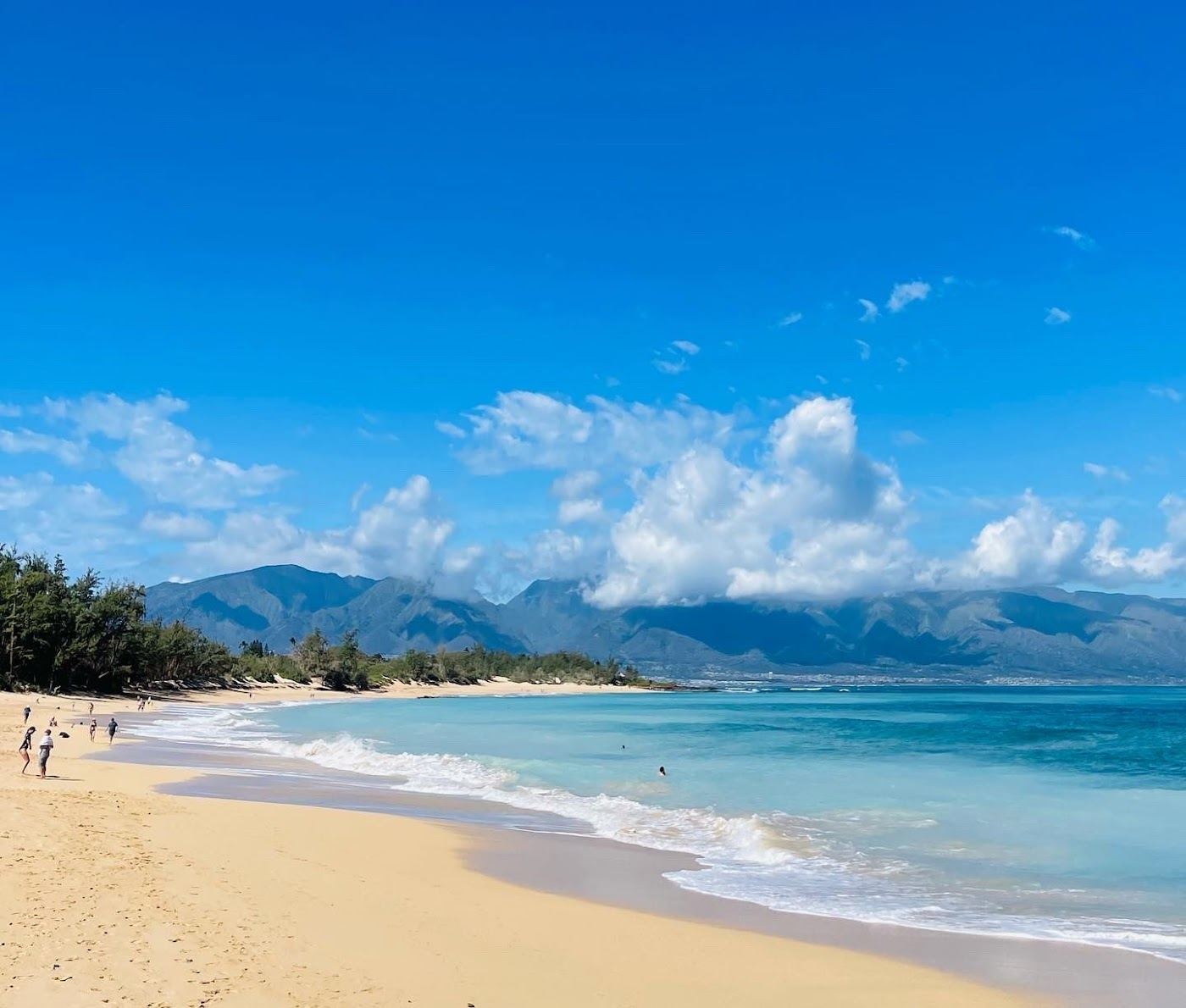 The long dune backed strand of Baldwin Beach with its calm Baby Beach pool near Paia on Maui