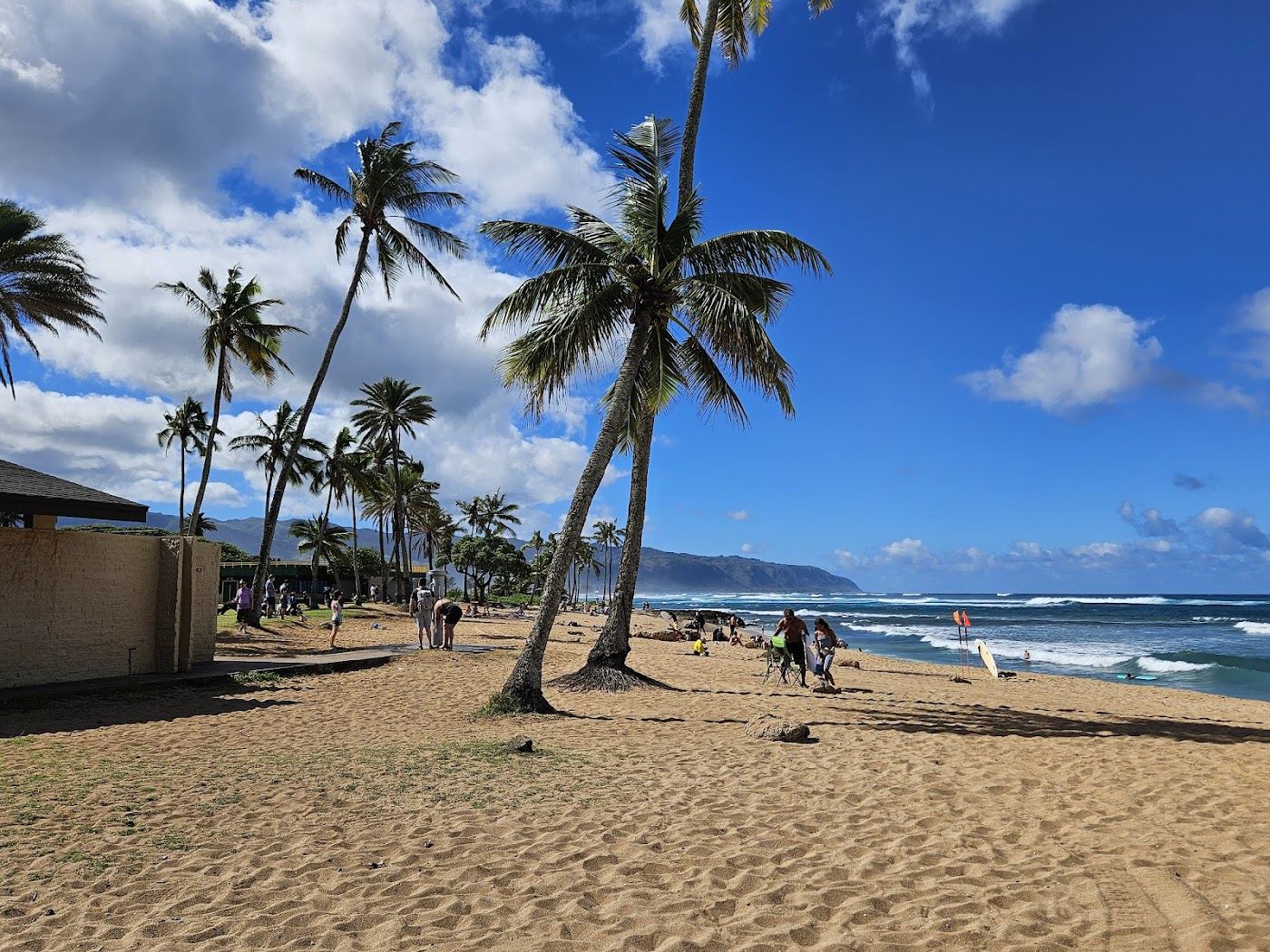 The harbour side sand and protected lagoon of Haleiwa Alii Beach Park on the North Shore of Oahu