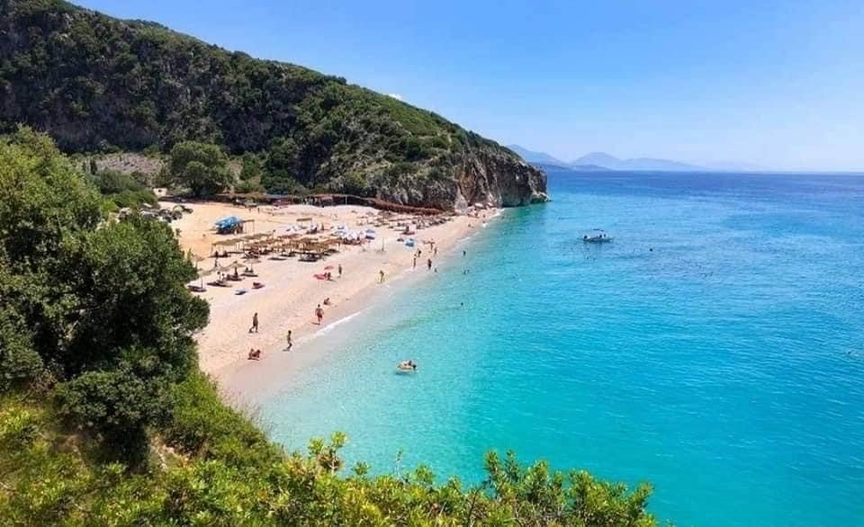 A pebble and sand cove at the mouth of a canyon on Albania's still uncrowded Ionian coast.