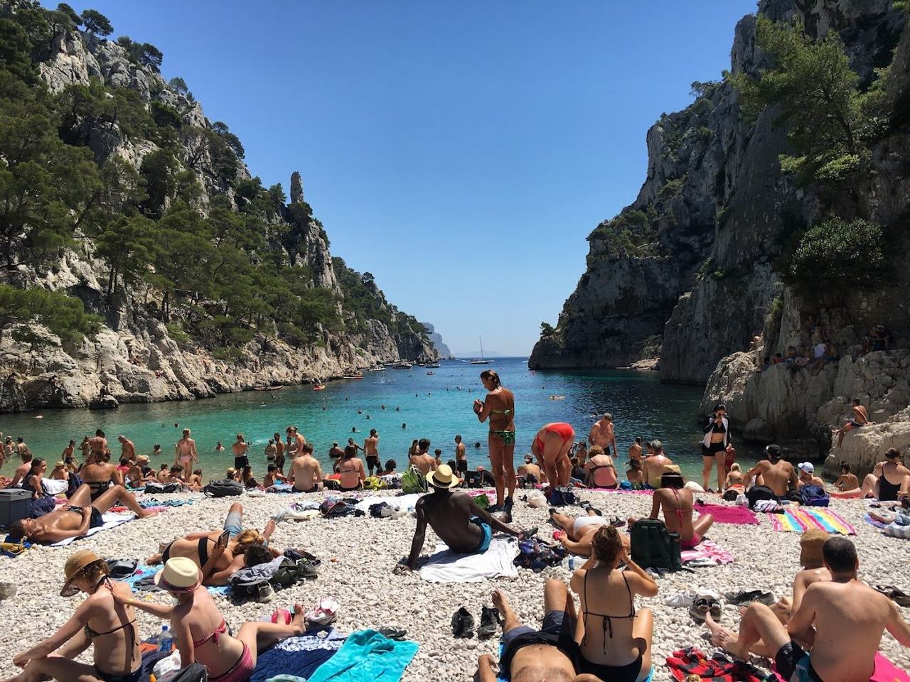 A slim white pebble beach deep inside a limestone fjord between Cassis and Marseille.