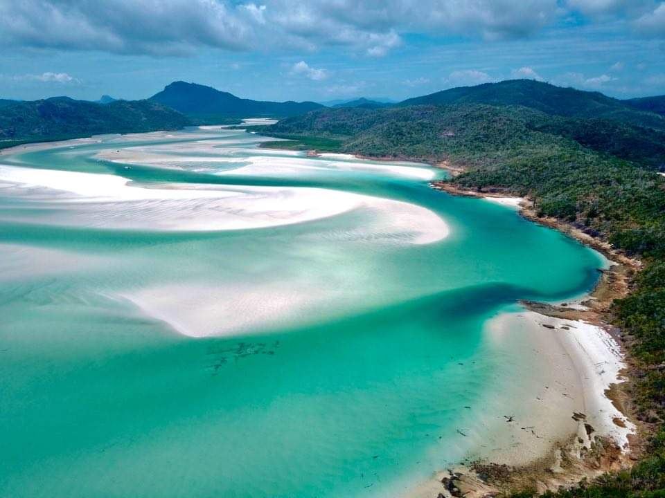 Swirling white sand and turquoise water at Hill Inlet on Whitsunday Island