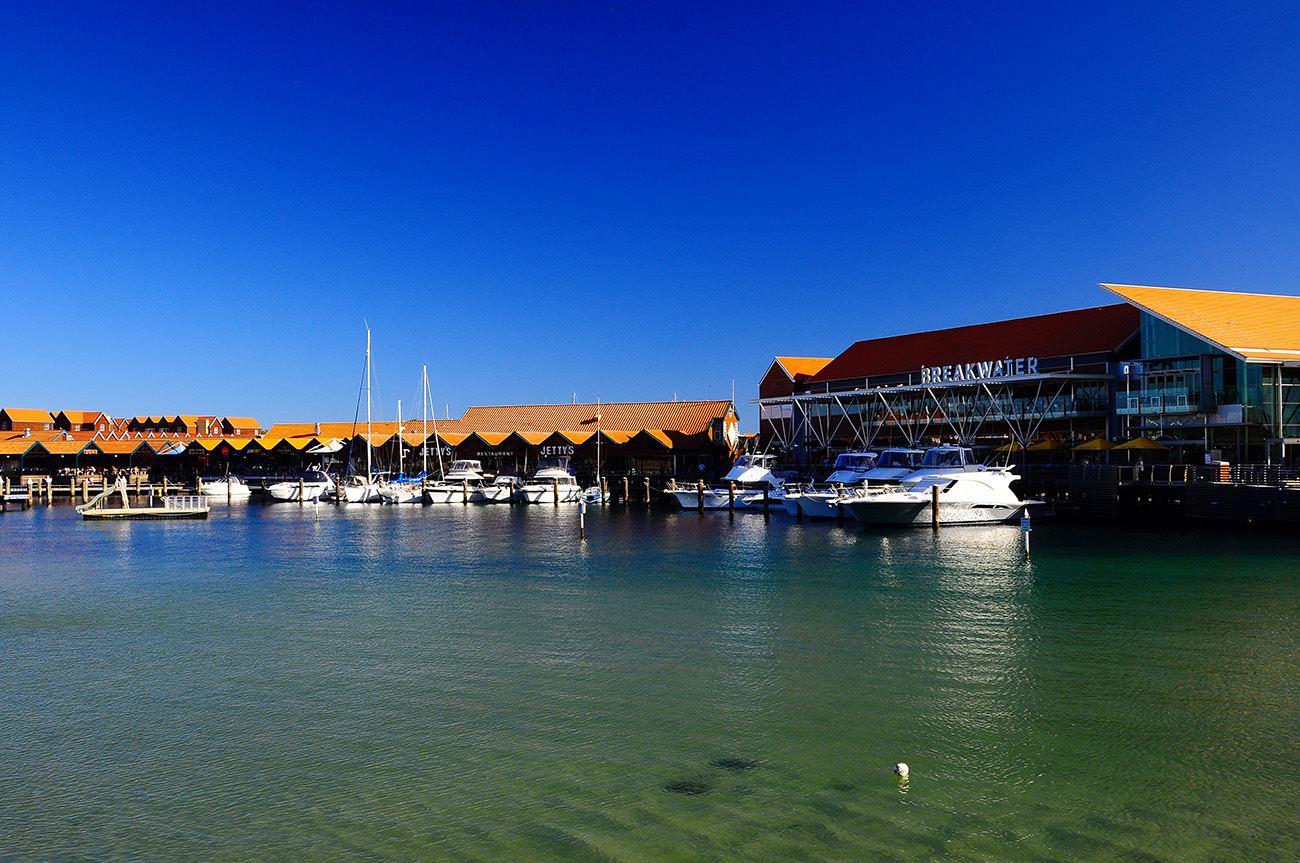 The sheltered man made swimming beach and clear calm water inside Hillarys Boat Harbour in the northern suburbs of Perth