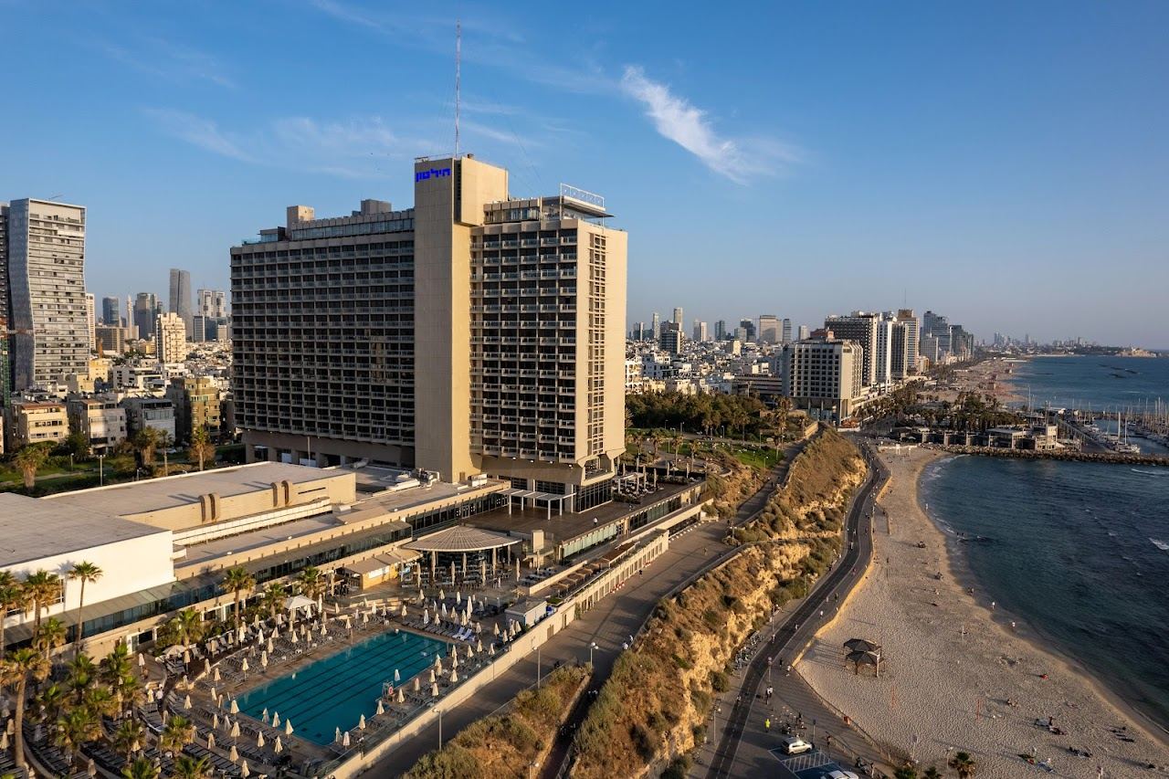 The soft sand and sunbeds of Hilton beach below Independence Park in north Tel Aviv