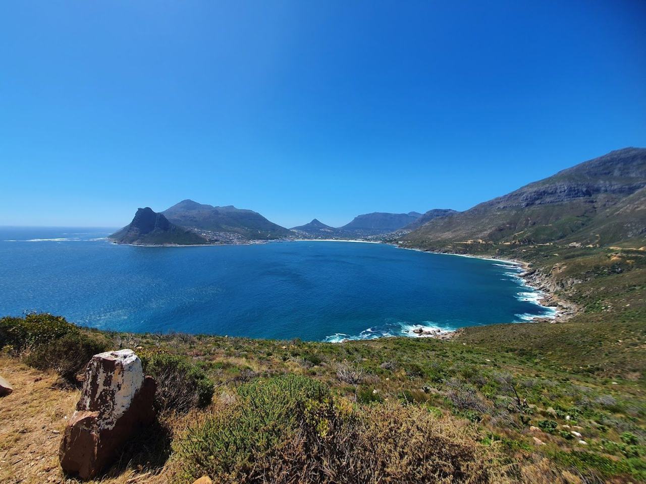 Hout Bay Beach and the Sentinel peak with the harbour beyond in Cape Town