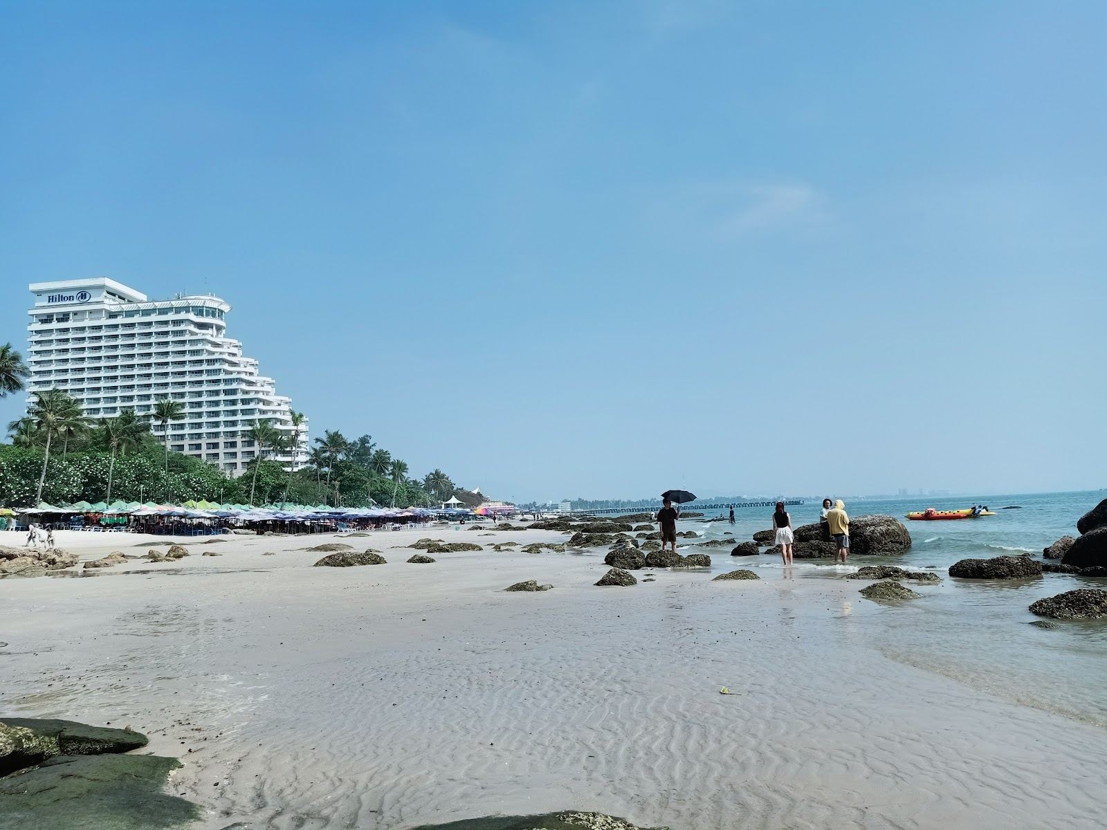 Long shallow sandy beach and warm sea at Hua Hin on the Gulf of Thailand, a favourite for kitesurfing