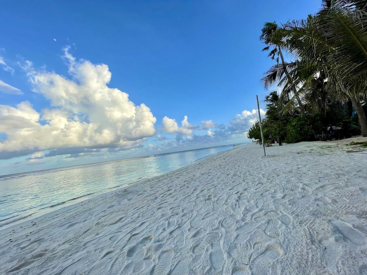 Hulhumale Beach in the Maldives, a long strip of pale sand beside a calm lagoon