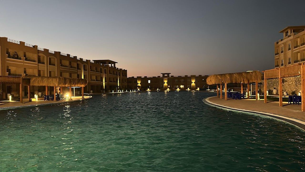 The calm clear Red Sea and sandy shore of the bay at Sahl Hasheesh near Hurghada in Egypt