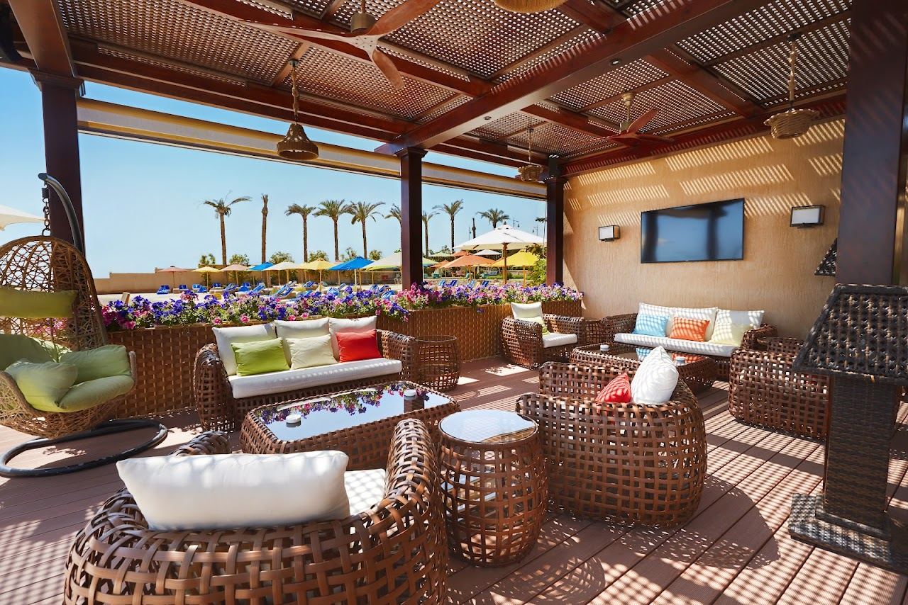 Sunbeds and shade on the white sand of the managed Mahmya beach club on Giftun Island near Hurghada