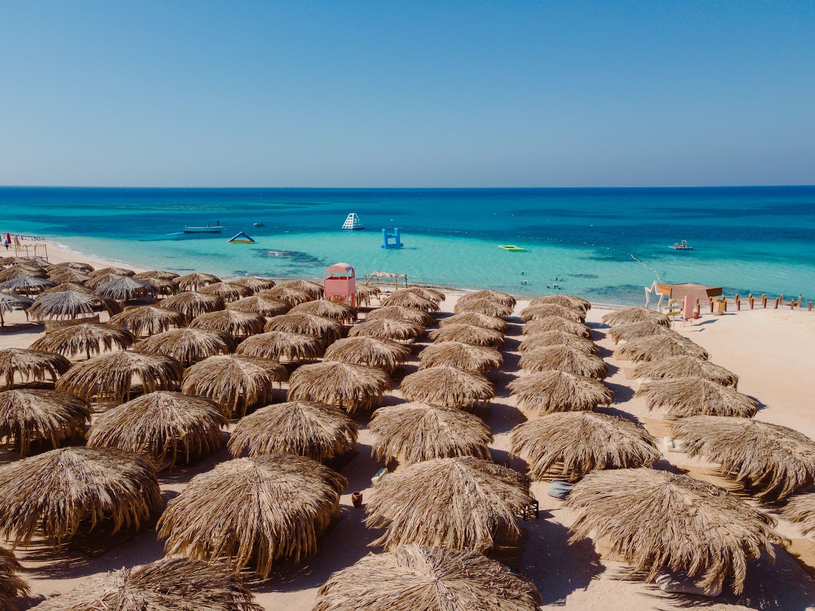 Quiet stretch of pale island sand and turquoise water at Paradise beach on Giftun Island near Hurghada