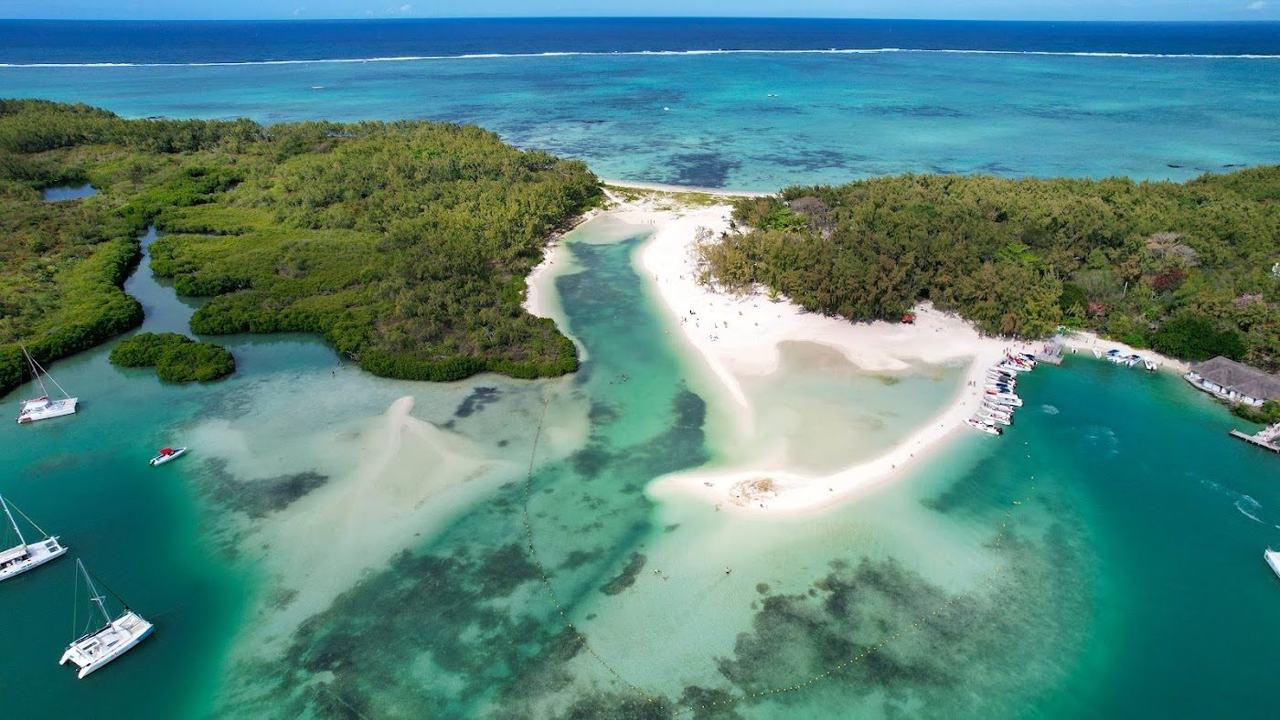 The white sand and turquoise lagoon of Ile aux Cerfs island off east Mauritius