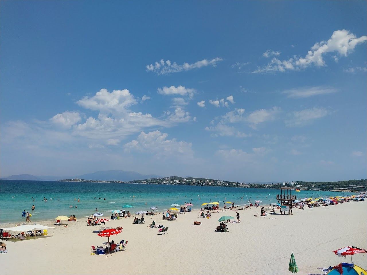Wide soft sand and warm shallow turquoise water at Ilica beach east of Cesme town in Turkey