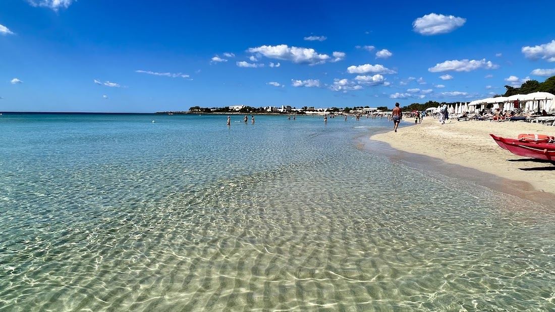 Punta Prosciutto in Porto Cesareo, Puglia with clear water and sand