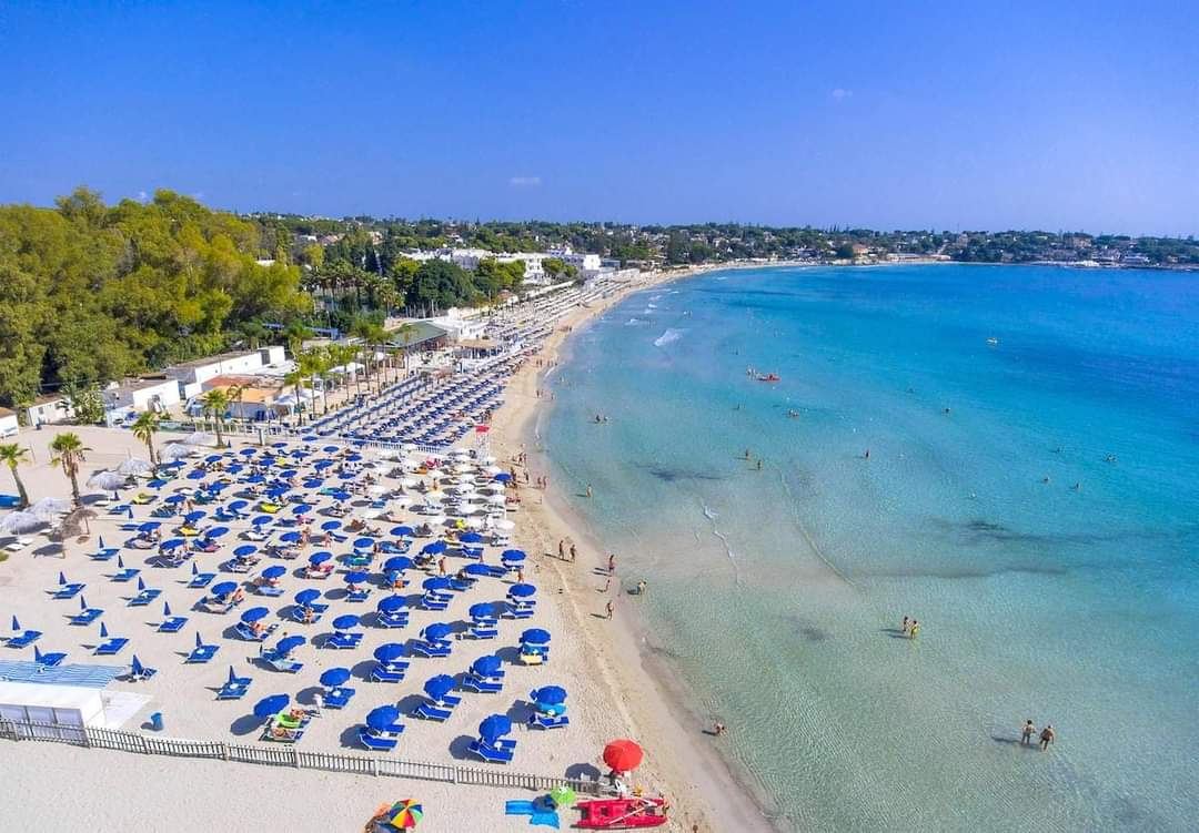 Fontane Bianche in Syracuse, Sicily with clear water and sand