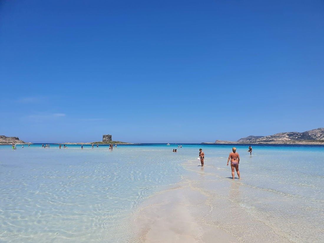 La Pelosa in Stintino, Sardinia with clear water and sand