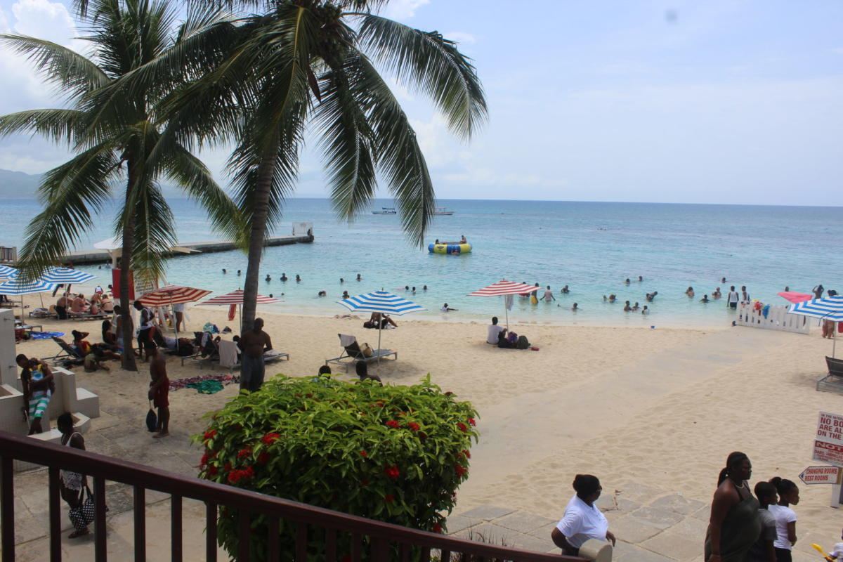 Calm clear water and soft sand on a gentle family beach in Montego Bay Jamaica