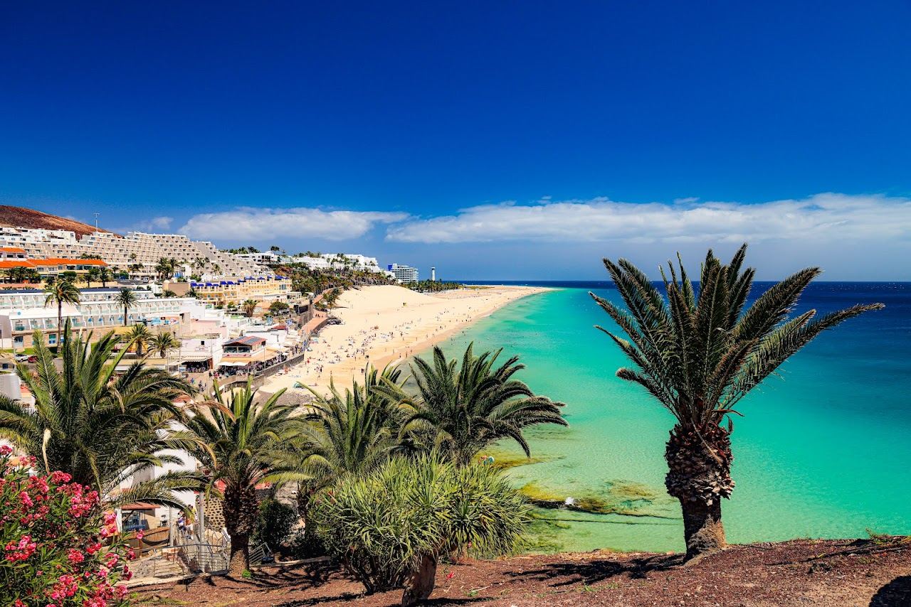 Long broad golden beach and warm shallow water at Playa de Jandia in southern Fuerteventura