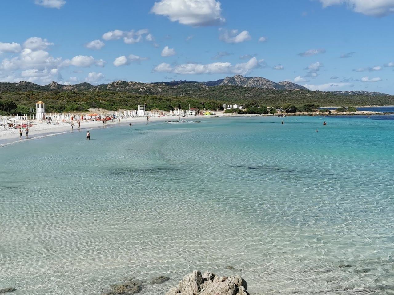 Warm clear water and famous sands, with July sun reliable and the colour at its peak.
