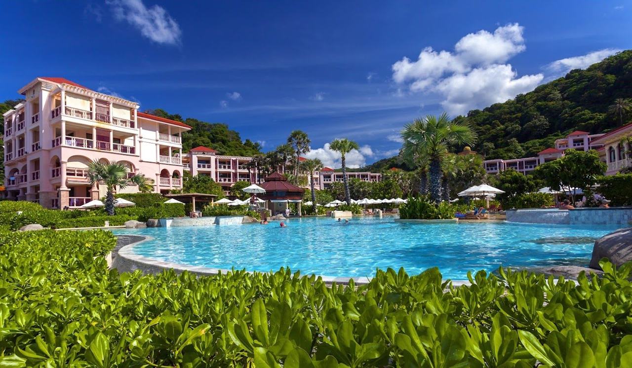 Daybeds and cabanas facing the sea at Coast Beach Club at the Centara Grand on Karon Beach