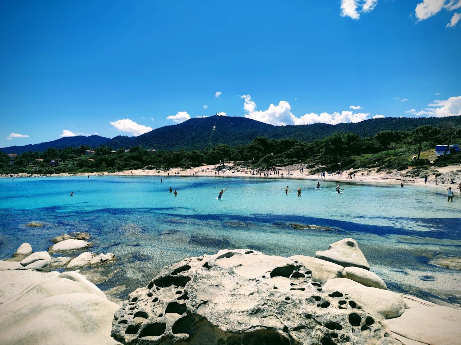 Fine white sand and shallow turquoise water at Karydi beach near Vourvourou on Sithonia