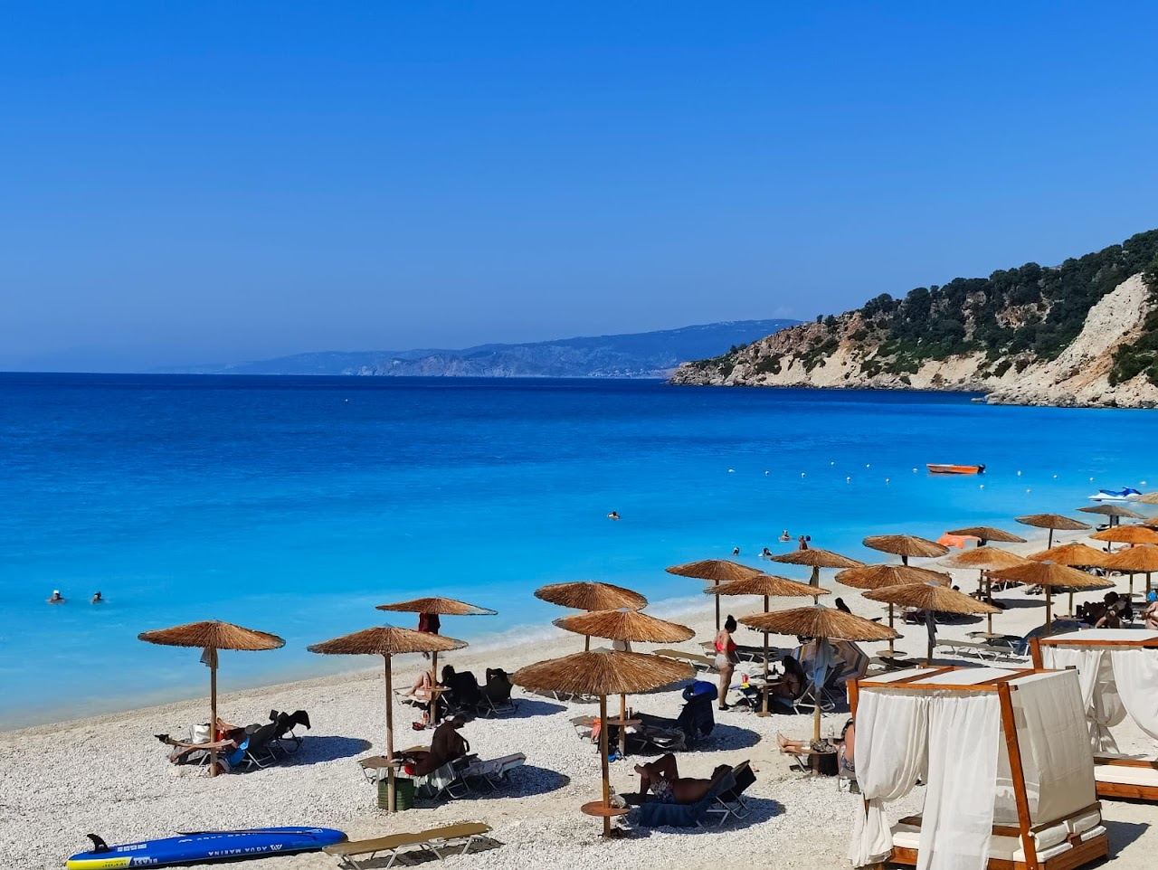 The clear deep water and pebbles of Agia Kiriaki Beach near Zola on the Erisos peninsula of Kefalonia