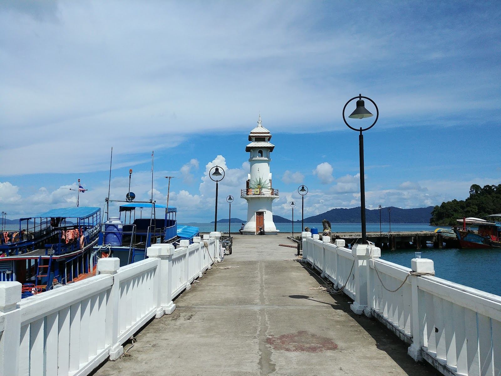 Boats moored in the bay at the Bang Bao pier on Koh Chang, the launch point for dive and snorkel trips in Thailand
