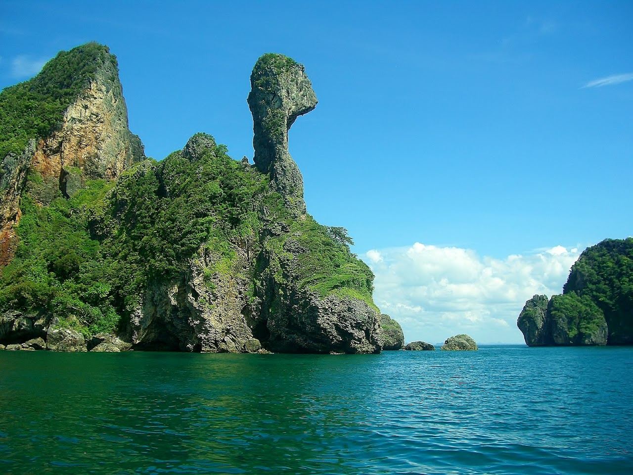 The chicken shaped limestone rock and pale sandbar of Koh Kai near Ao Nang in Krabi