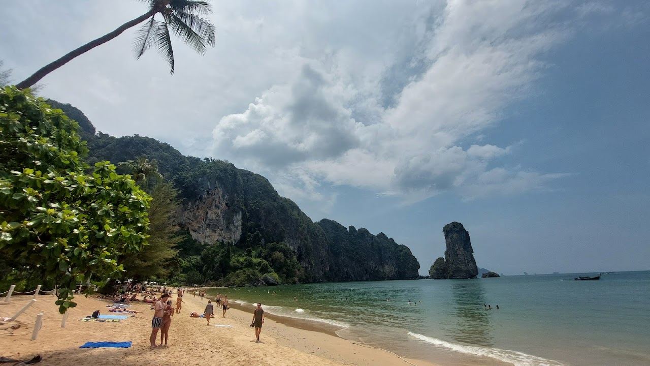 Clear shallow water and white sand at an island beach off Krabi in Thailand