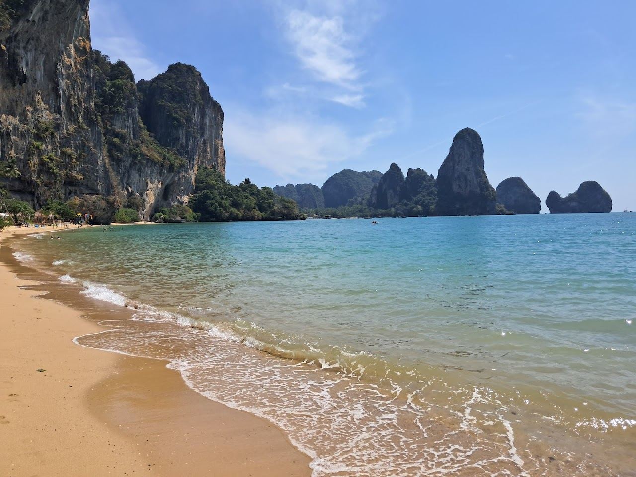 Limestone cliffs rising over the rocky cove of Tonsai Beach in Krabi