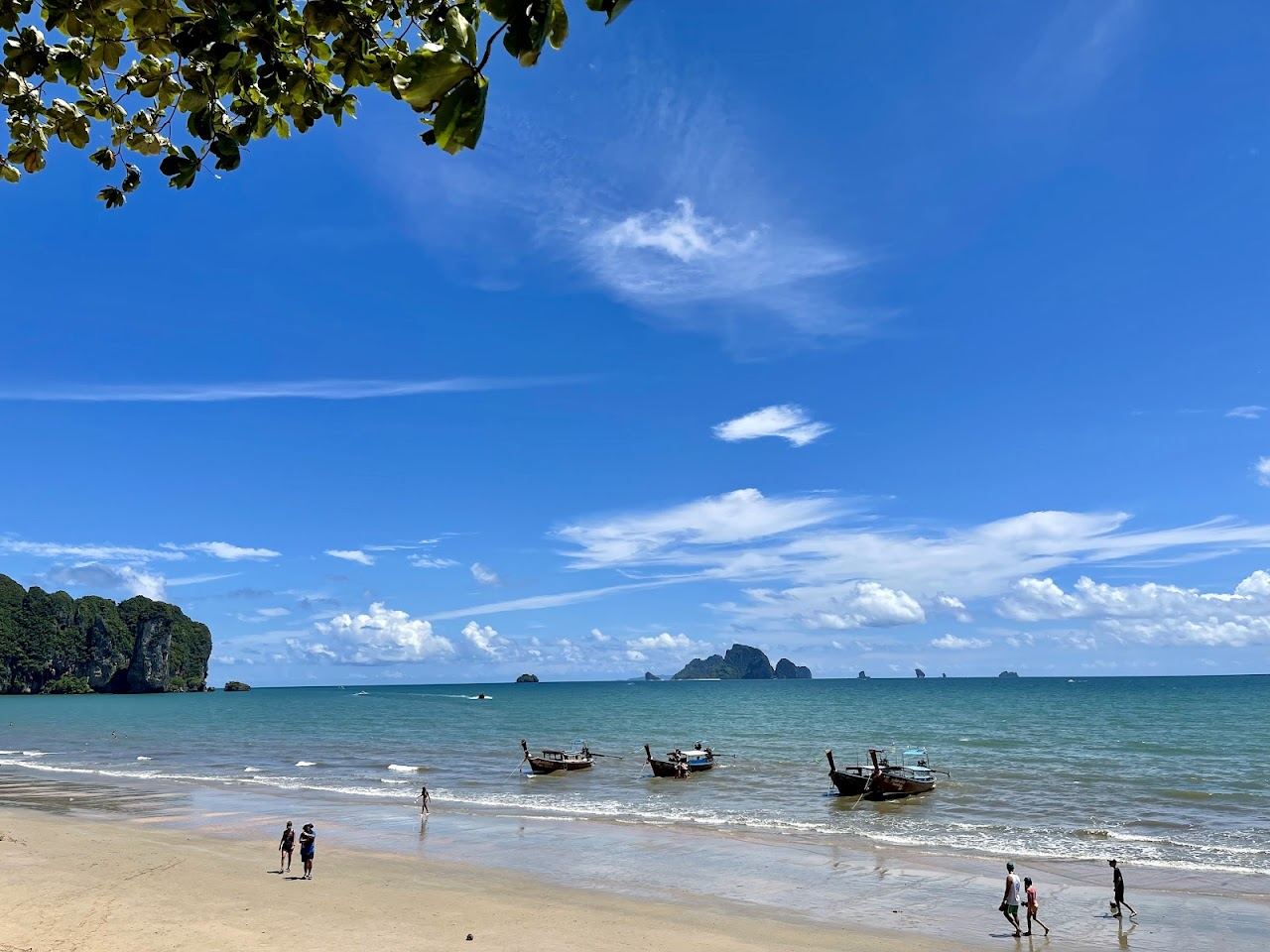 Calm Andaman Sea and limestone islands off Ao Nang in Krabi under a clear dry season sky