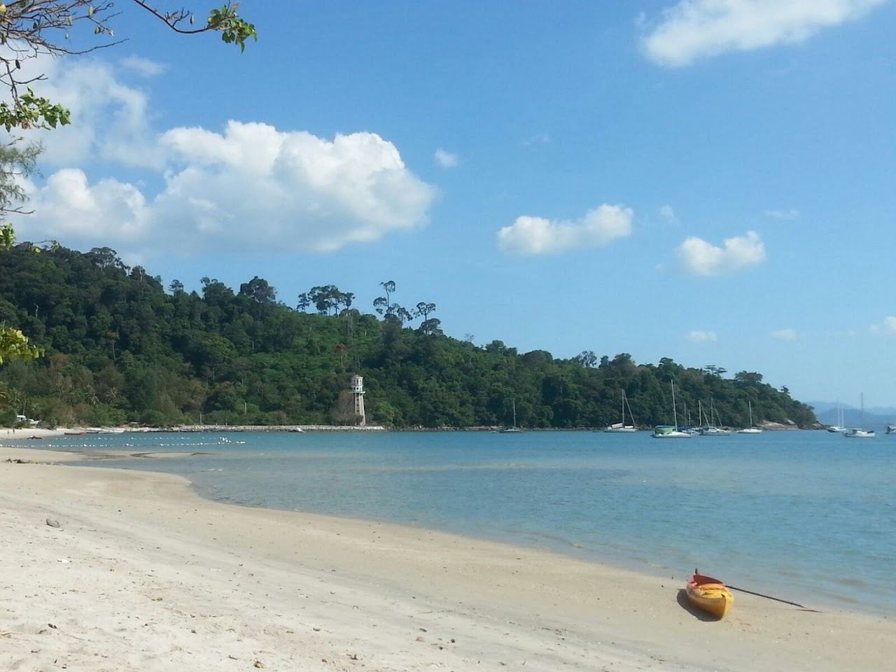 Calm sheltered water and soft sand at Pantai Kok on the west coast of Langkawi