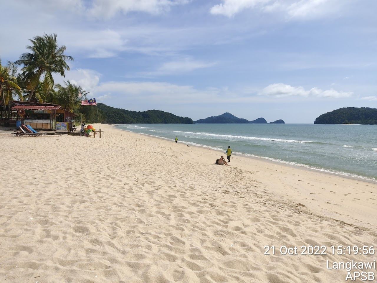 Soft pale sand and calm Andaman Sea on Pantai Tengah in southern Langkawi