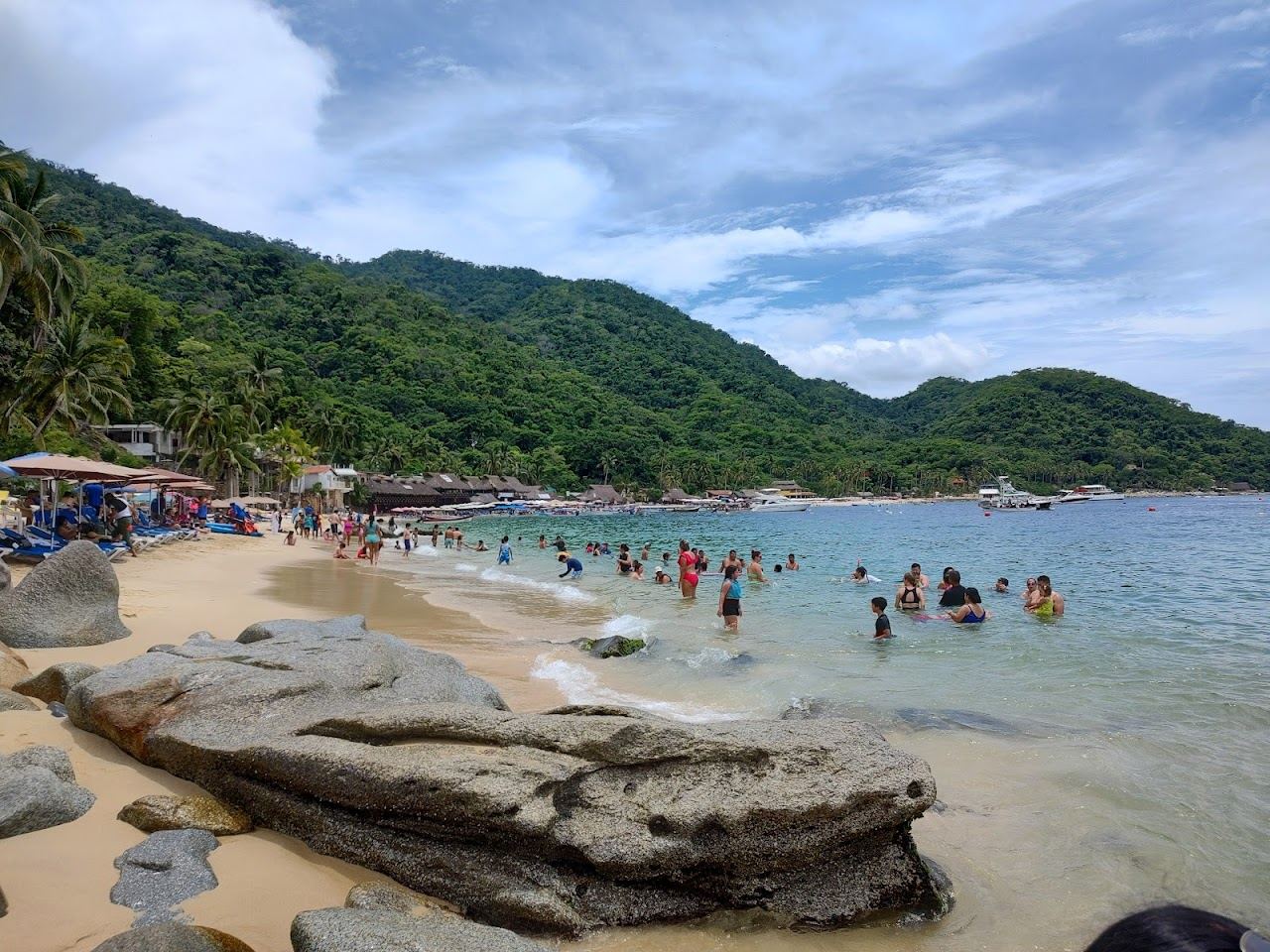The golden sand and calm bay of Las Animas Beach on the south shore near Puerto Vallarta