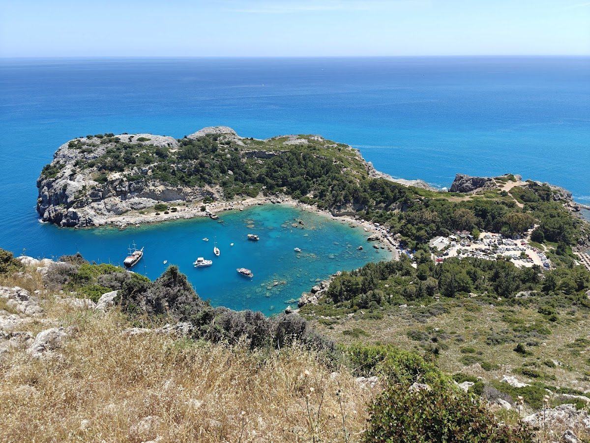 Rocky turquoise bay on the coast of Rhodes