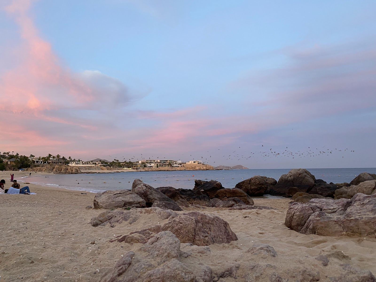Clear turquoise water in the sheltered cove at Chileno Beach on the Los Cabos corridor