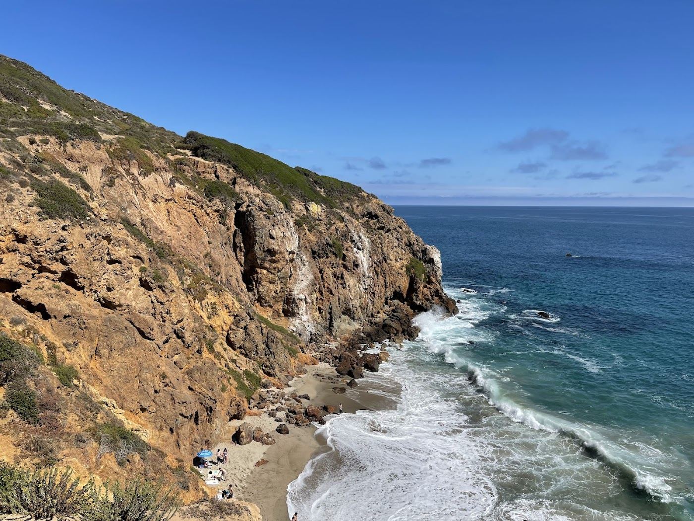 Rocky headland and kelp lined water at Point Dume, Malibu, California