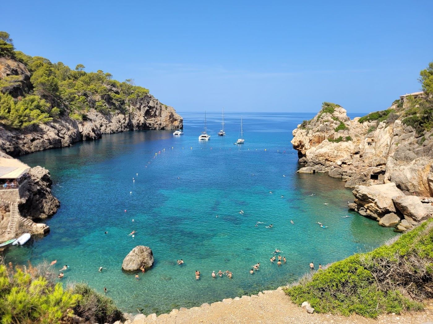 Clear water over rocks at a small cove on the Tramuntana coast of Mallorca