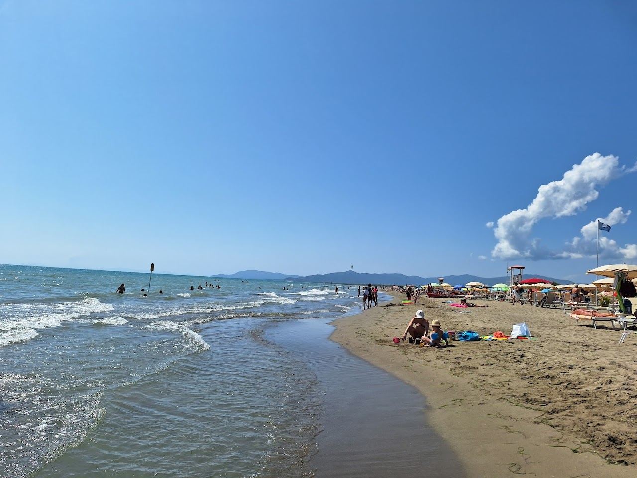 The wide pine backed sand of Marina di Grosseto on the Maremma coast