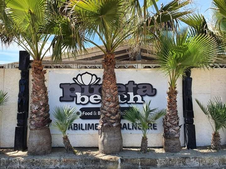 The pine backed bagni and golden sand of the Marina di Grosseto beachfront on the Maremma coast