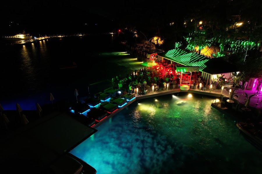 Pool, sunbeds and jetty at Palace Beach Club on the Icmeler bay near Marmaris