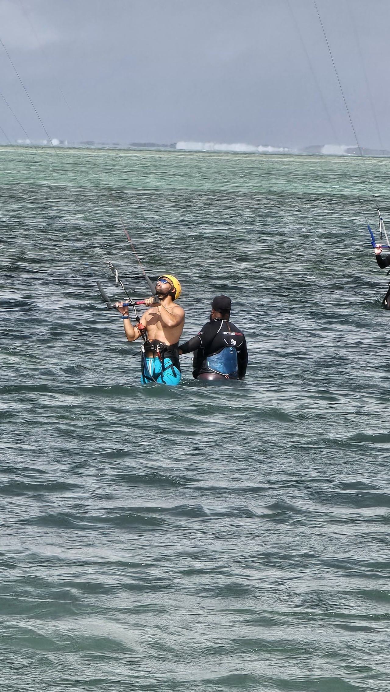Kitesurfers on the turquoise lagoon at Le Morne in southwest Mauritius